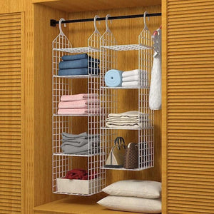Organizador suspenso de aramado para guarda-roupa, perfeito para mulheres que buscam praticidade e elegância na organização. Com design moderno, permite armazenar roupas, toalhas e bolsas sem ocupar espaço. Fácil de instalar e ideal para deixar seu armário sempre arrumado e sofisticado.